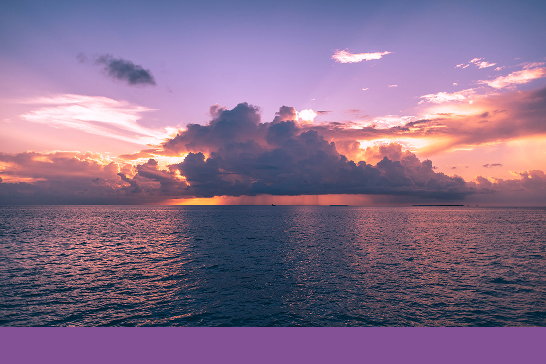 Calm ocean with clouds obscuring sunset | Just Another Mary